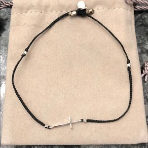 Tai bracelet with cross